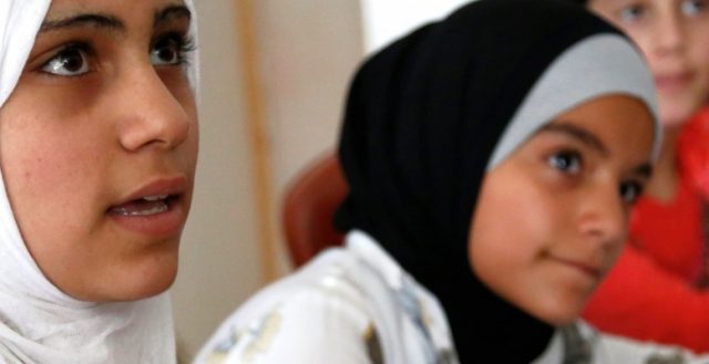 Syrian girls at a community centre in Lebanon. Photo: Russell Watkins/DfID