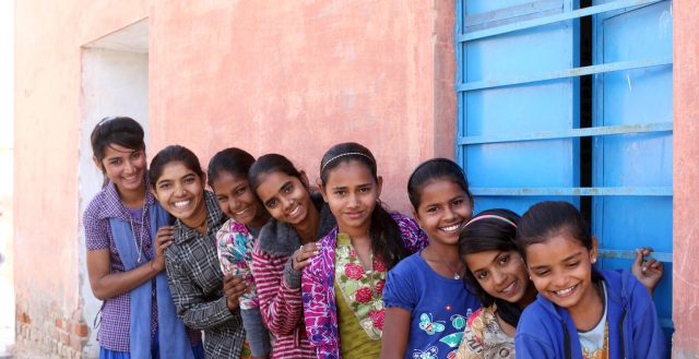 Young adolescent girls meeting at the Anganwadi Centre in Rajasthan, India. Photo: Soumi Das/UNICEF