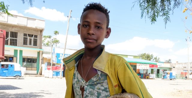 Adolescent boy working as a shoe shiner in Batu Ziway, Ethiopia. Photo: Nathalie Bertrams/GAGE