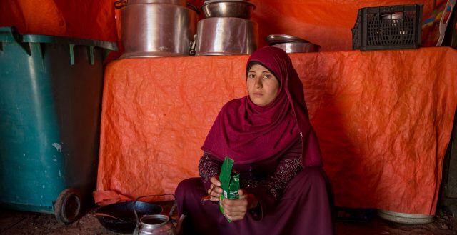 Adolescent married girl in an informal tented settlement in Jordan. Photo: Nathalie Bertrams/GAGE